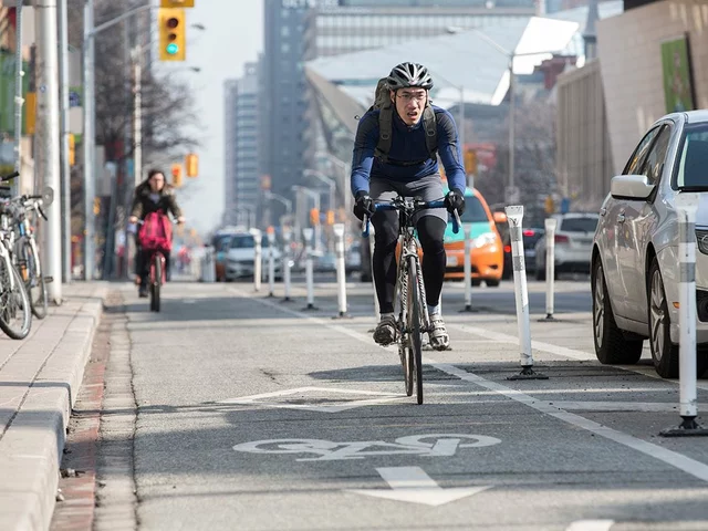 Is it safer to bike on the roads in the suburbs or in the city?